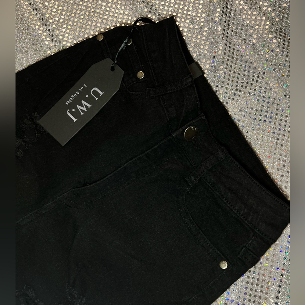 U.W.J Skinny Jeans 
Black ripped Size 5/6